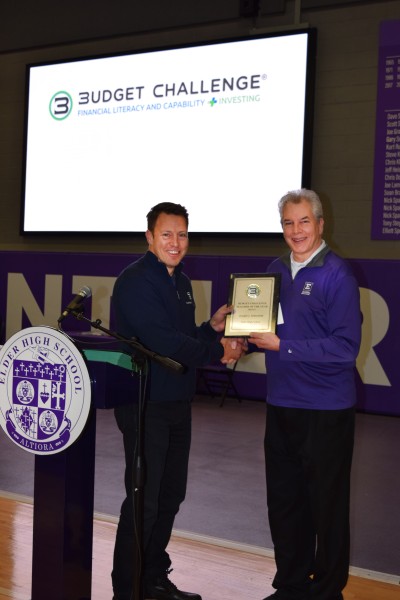 Dave Buten awards Joe Schoenfeld with plaque